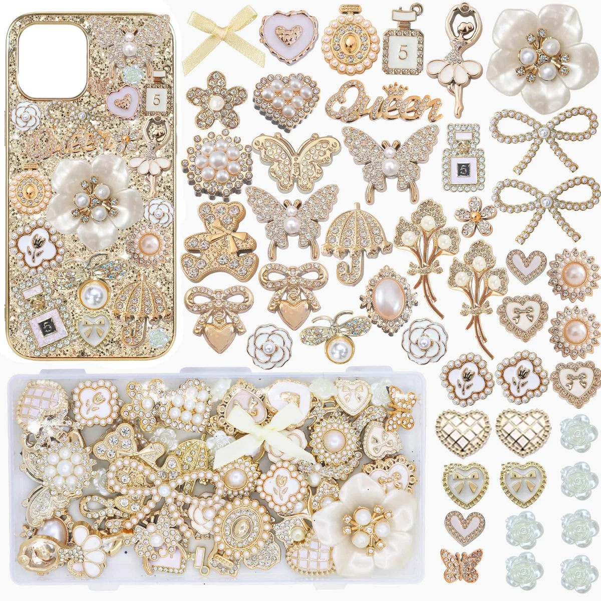 Flat tray of 46 gold and white sculpted charms — astronauts, stars, bows, planets, hearts