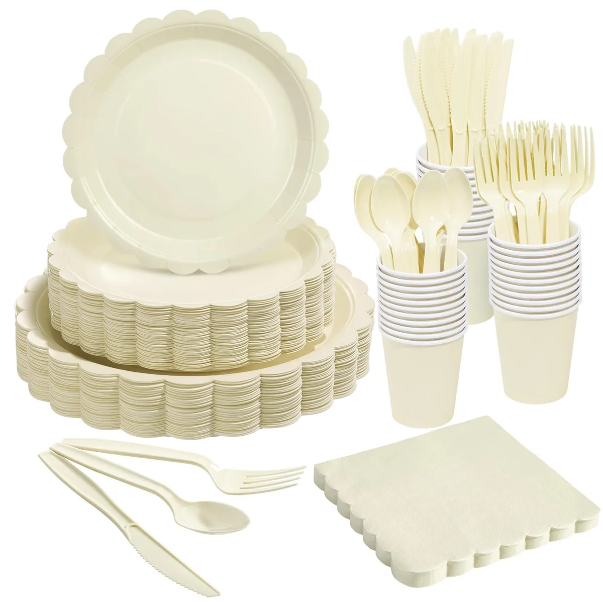 White square ceramic plates with floral design and scalloped edges, plus cups, napkins and cutlery