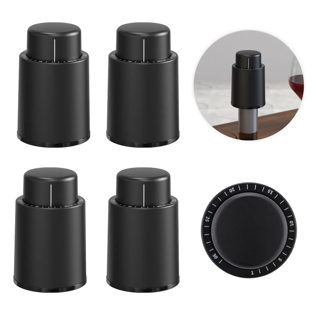 Four black vacuum wine stoppers with date dials on top