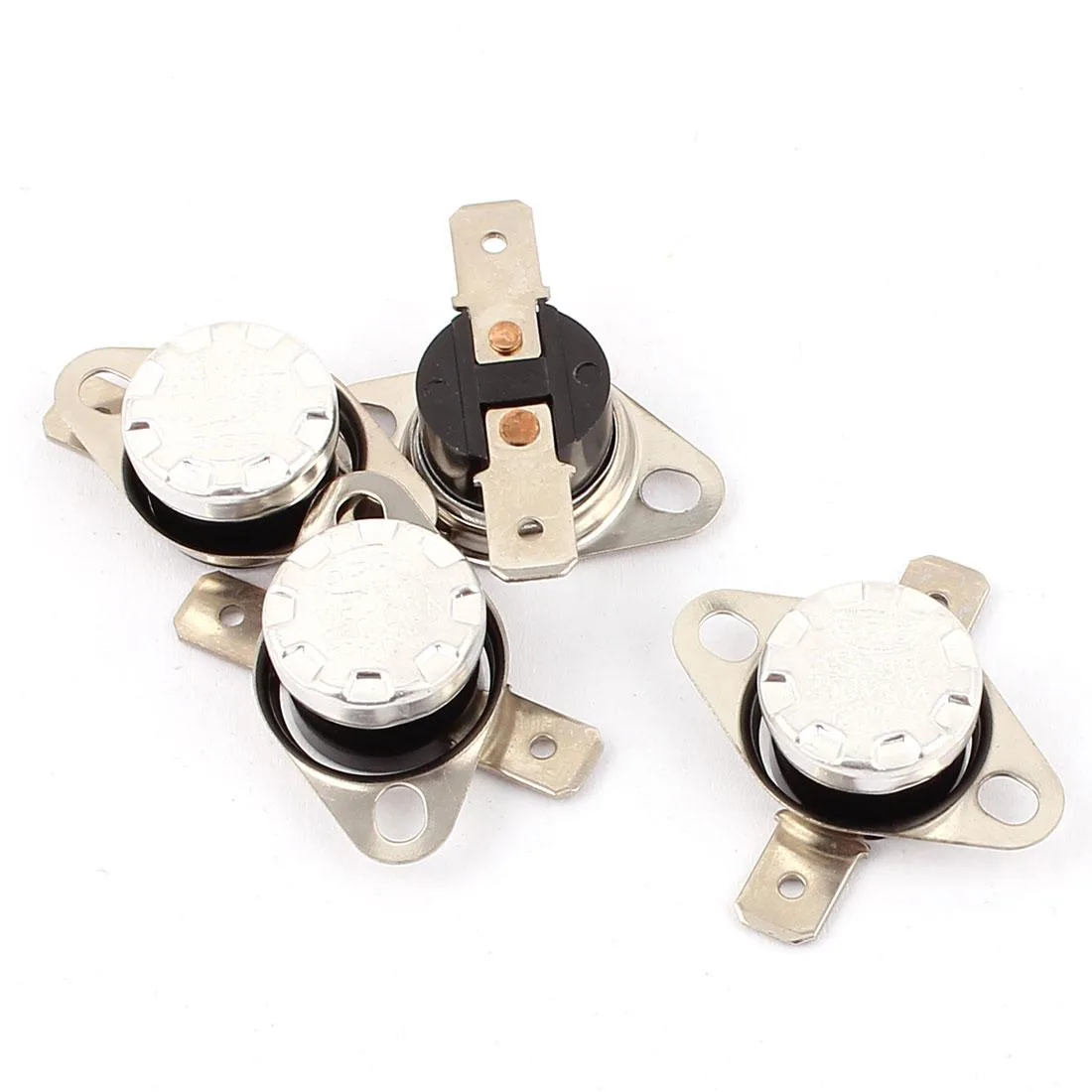 Four small rectangular thermal switches with two terminals each