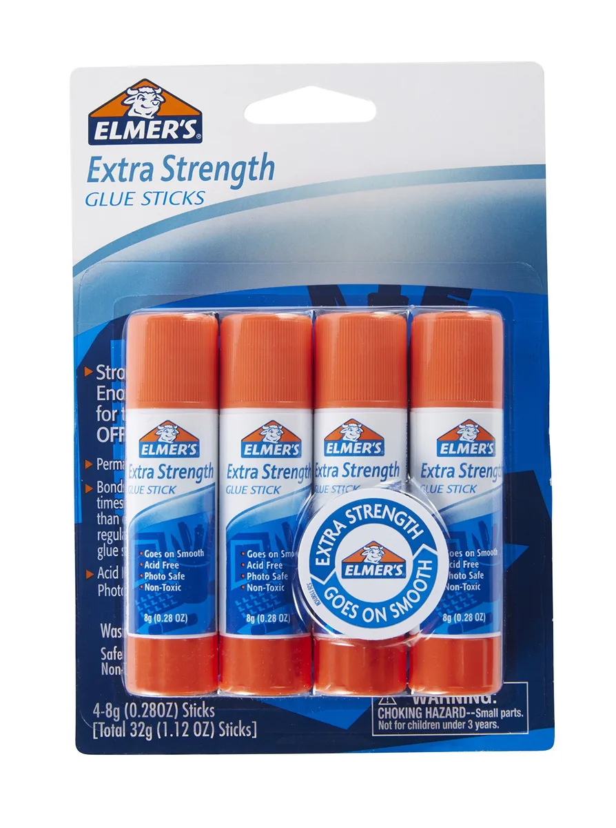Four white glue sticks in rectangular packaging