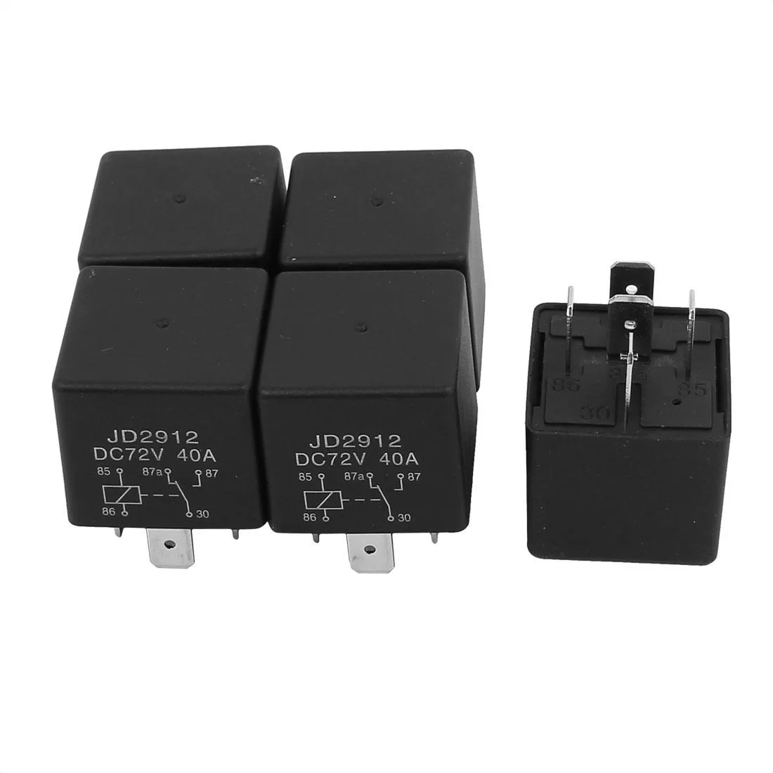 Five black cubic SPDT relays with five pins each