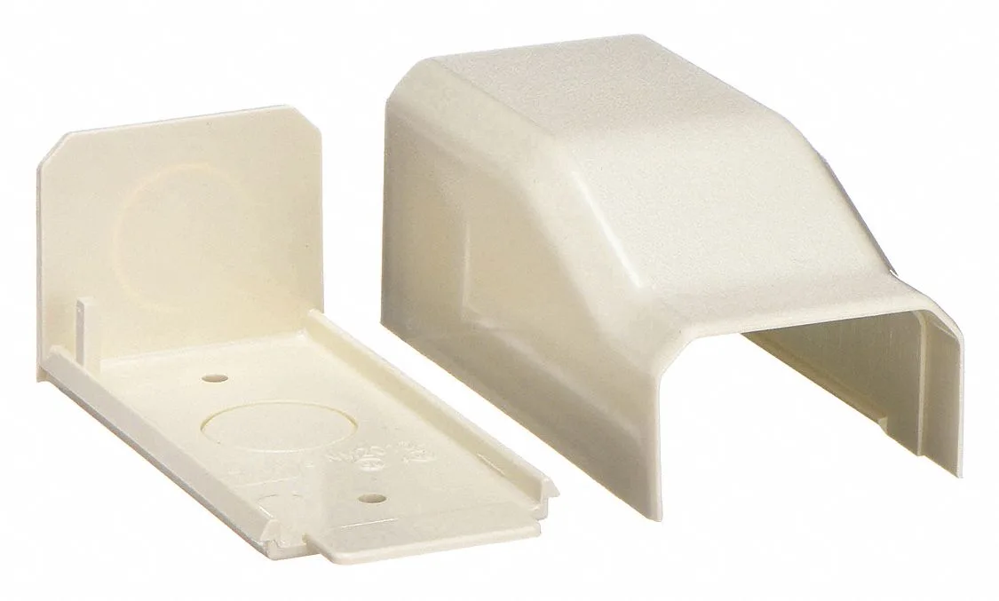 Ivory plastic end feed coupling, rectangular profile, screw-mount, single knockout visible