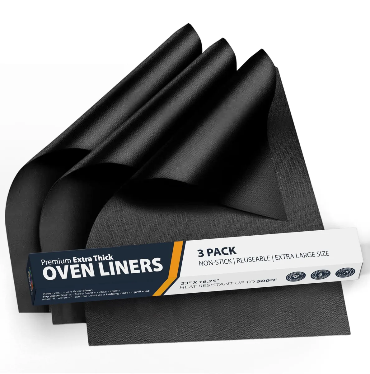 Three black rectangular oven liners stacked flat