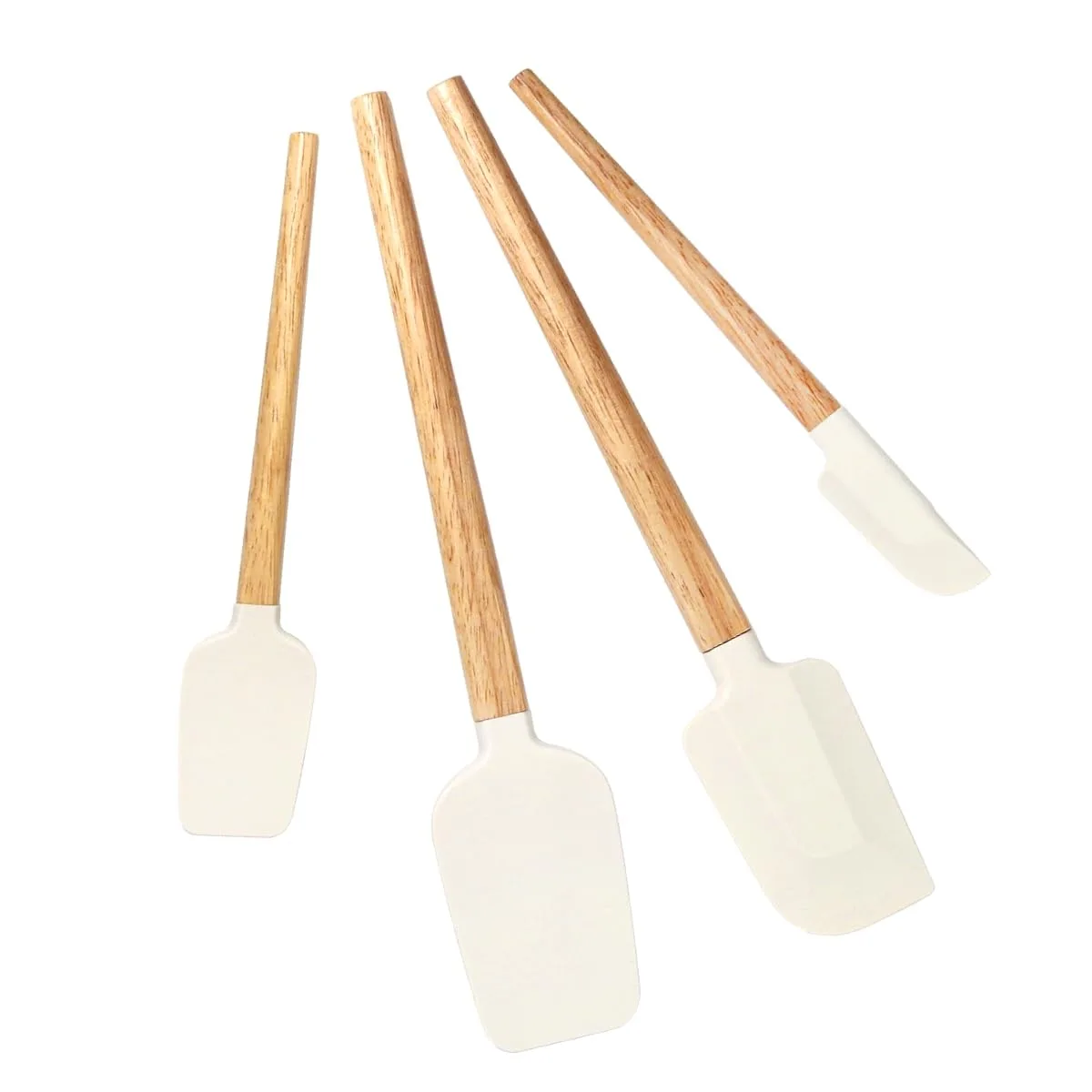 Four off-white silicone spatulas with walnut handles lying flat