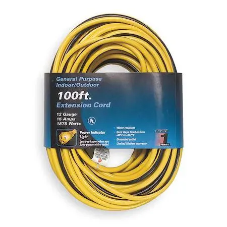 Yellow outdoor extension cord with black stripe, single grounded outlet, lighted end, coiled on ground