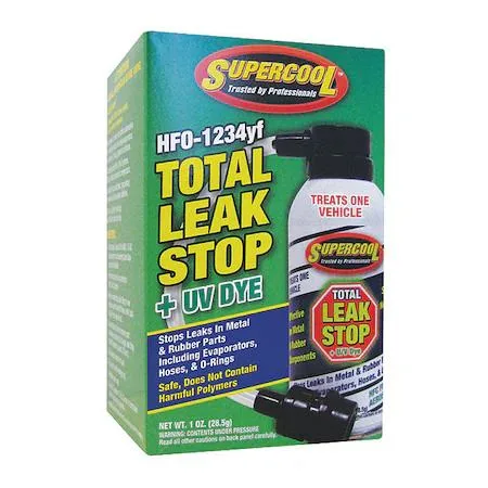Small boxed bottle of green-yellow liquid stop leak with UV dye for R-1234yf systems