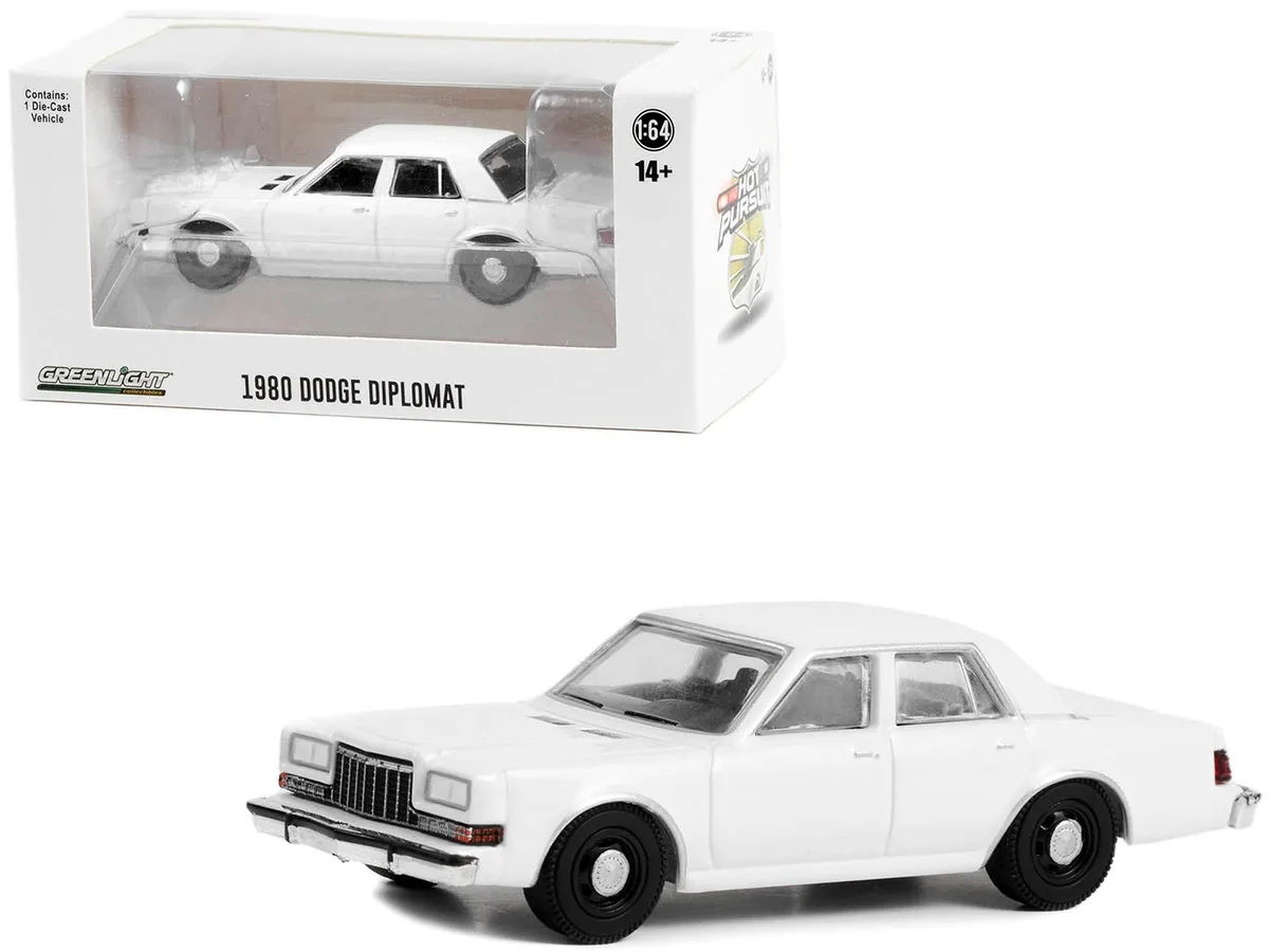 GREENLIGHT GREENLIGHT 1980-1989 Dodge Diplomat Police Unmarked White Hot Pursuit Hobby Exclusive 1/64 — product photo