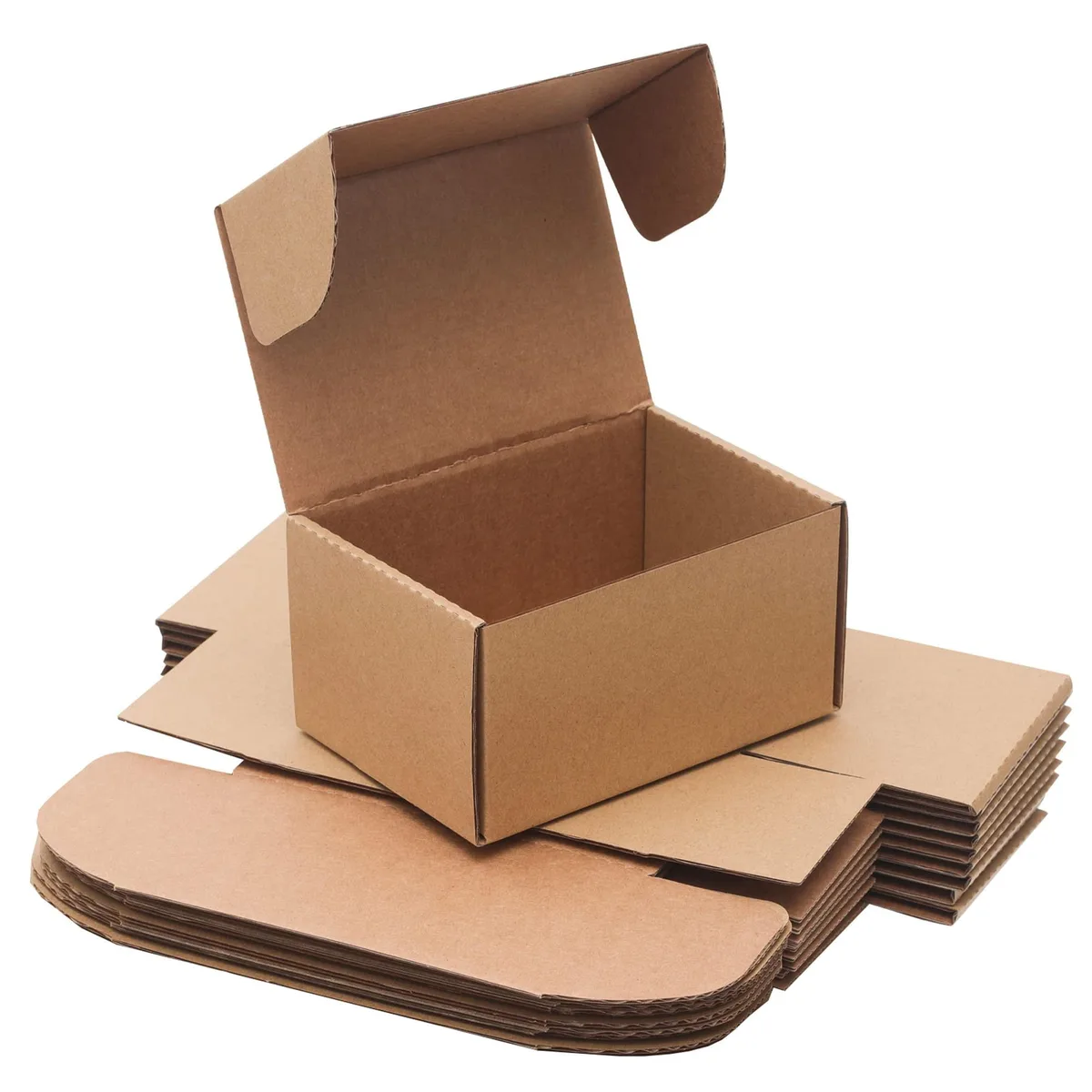 Ten flat-packed brown corrugated boxes with rippled edges, 6 by 4 by 3 inches