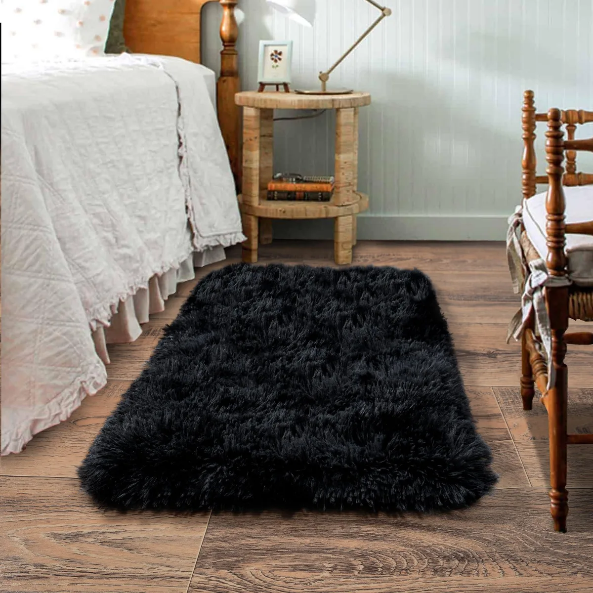 Black polyester runner rug with fluffy shag pile and non-slip backing