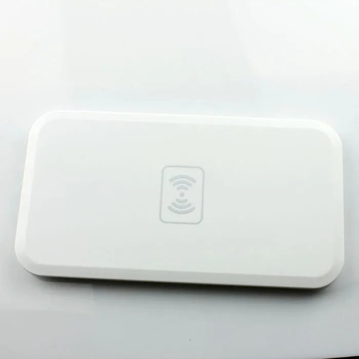 White Qi wireless charging pad with Micro USB receiver for Samsung Galaxy Note 2