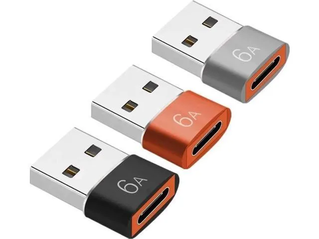 Three small silver USB-C to USB-A adapters side by side
