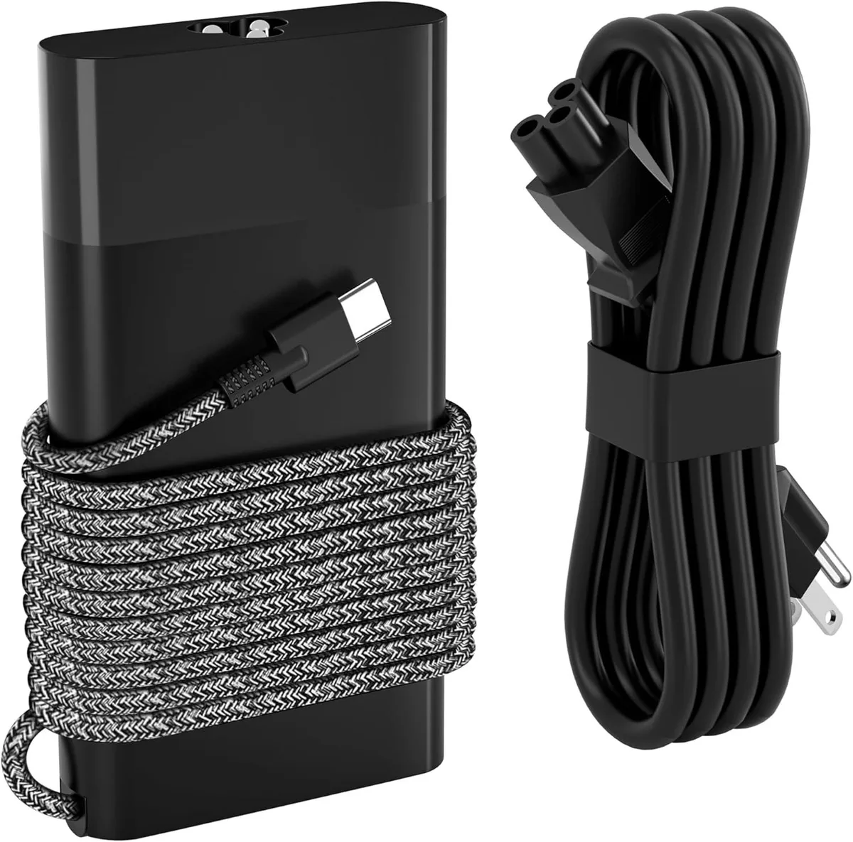 A slim rectangular 65W USB-C laptop charger with a matte finish and attached cable