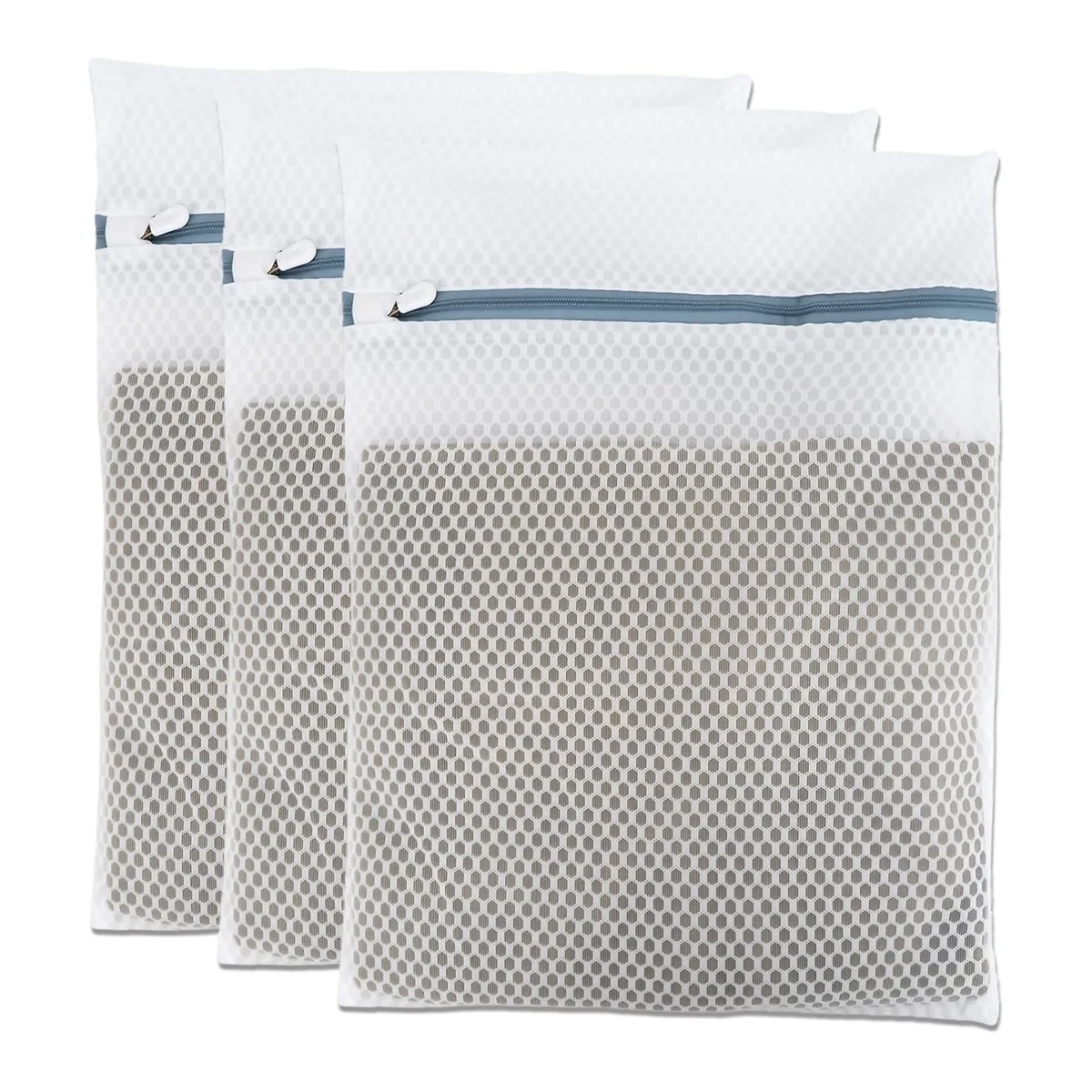 Three beige honeycomb mesh laundry bags with zippers, 12 by 16 inches
