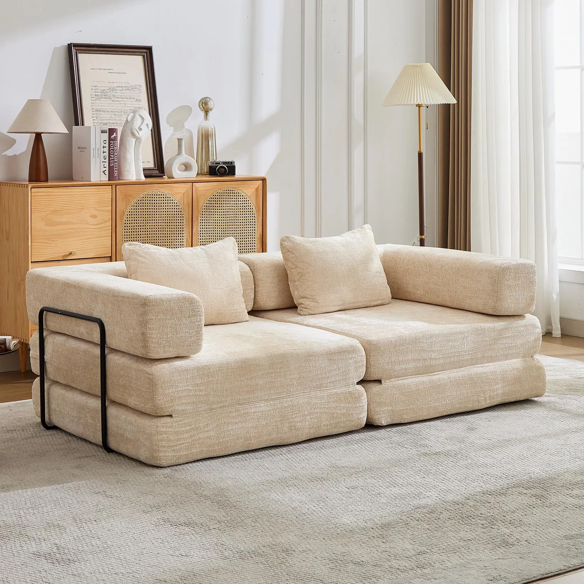 Beige chenille convertible floor sofa bed with folded armrests