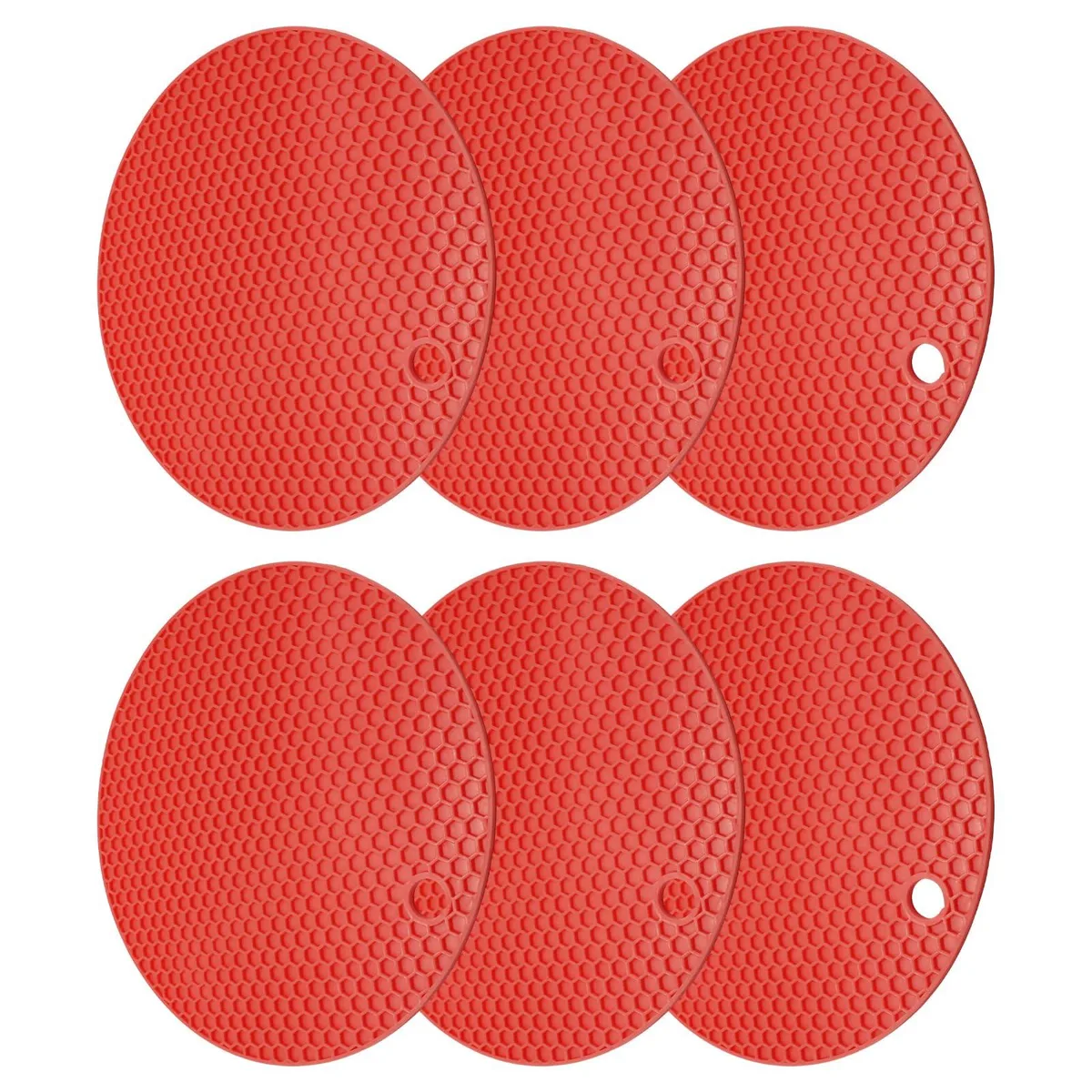 Six round red silicone trivets with honeycomb pattern and hanging holes