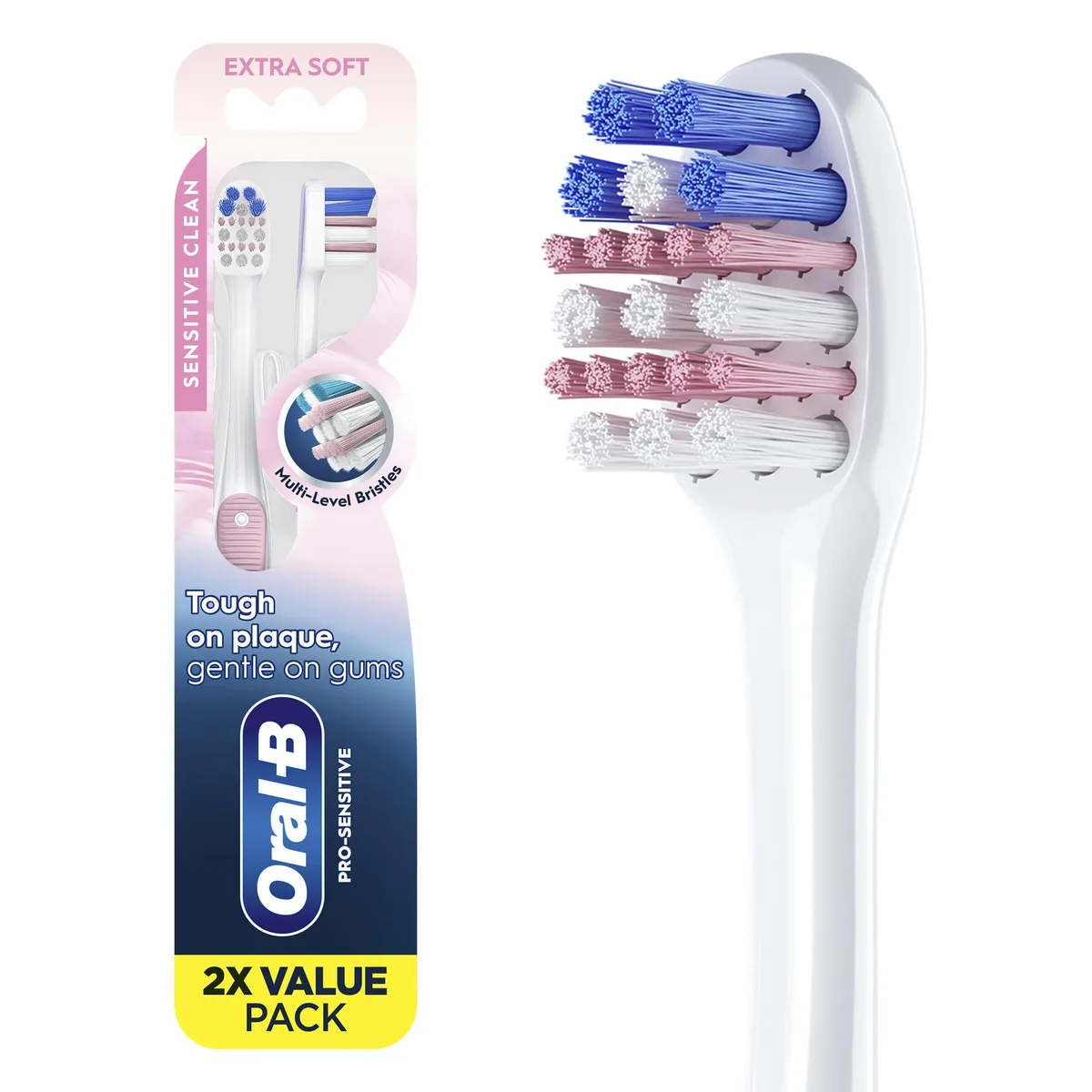 Two white compact manual toothbrushes with ultra soft bristles
