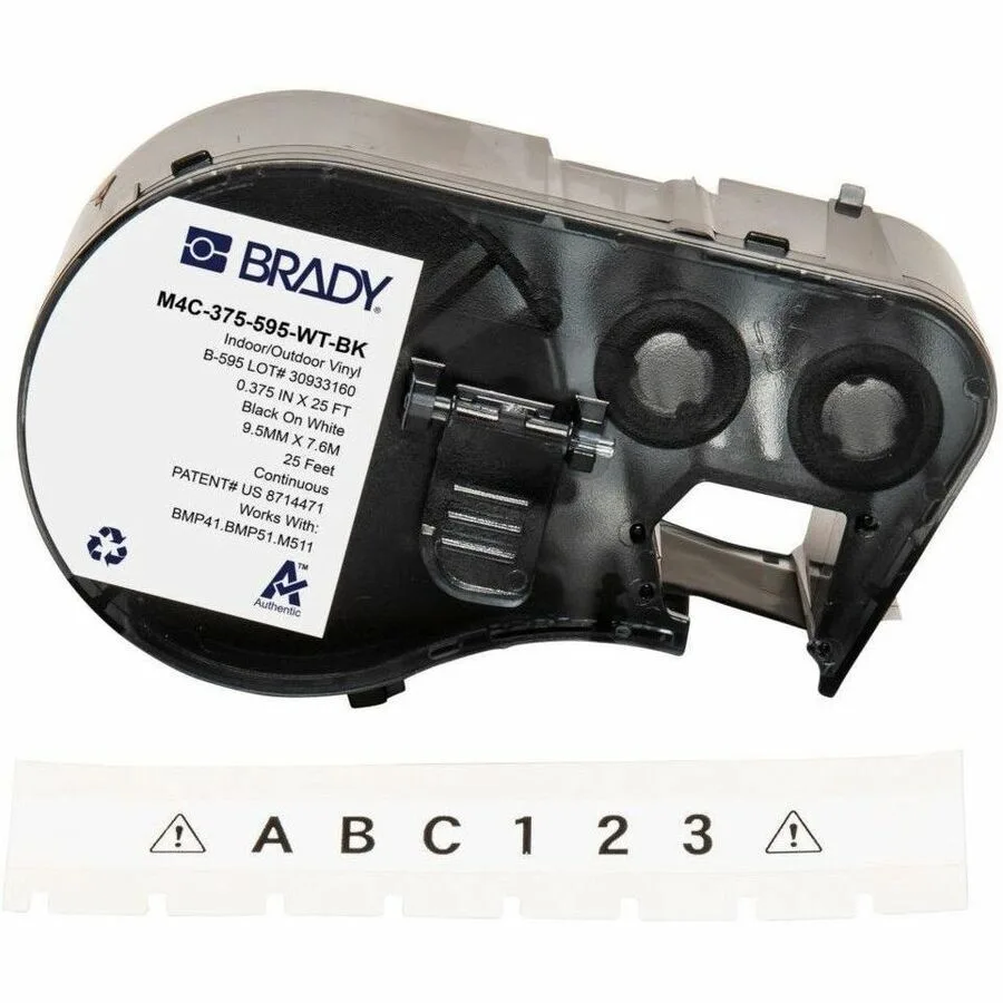 White adhesive vinyl label roll on a spool