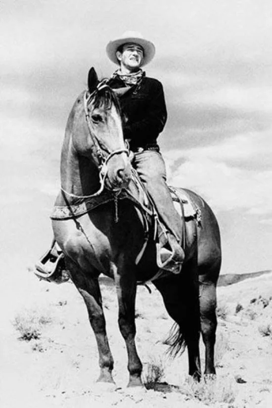 John Wayne on horseback poster print 24 by 36 inches