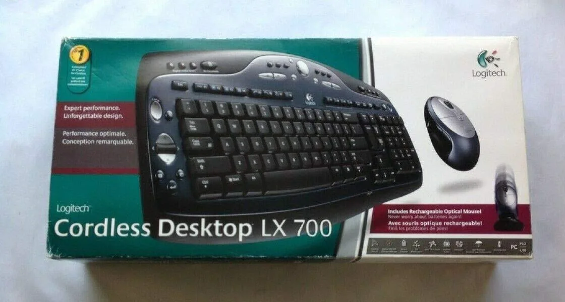 Logitech Cordless Desktop LX 700 keyboard and mouse with charging base