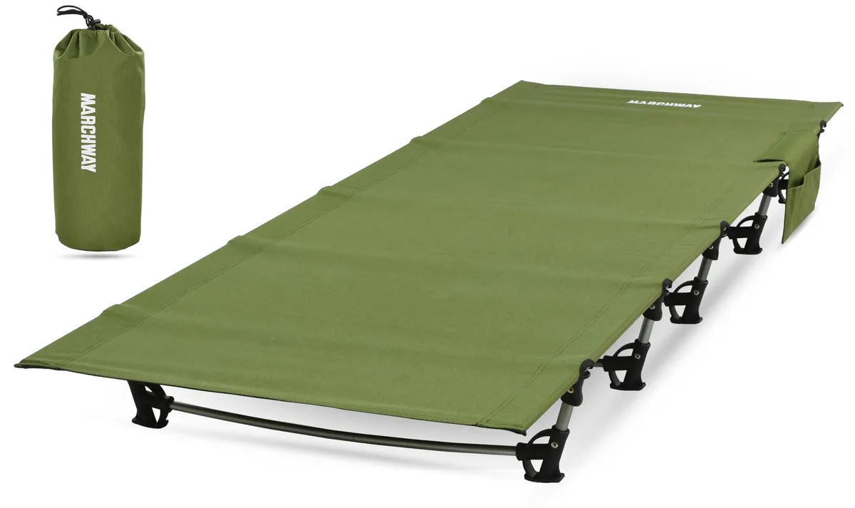 Olive-green folding cot with silver aluminium frame, packed in a grey stuff sack