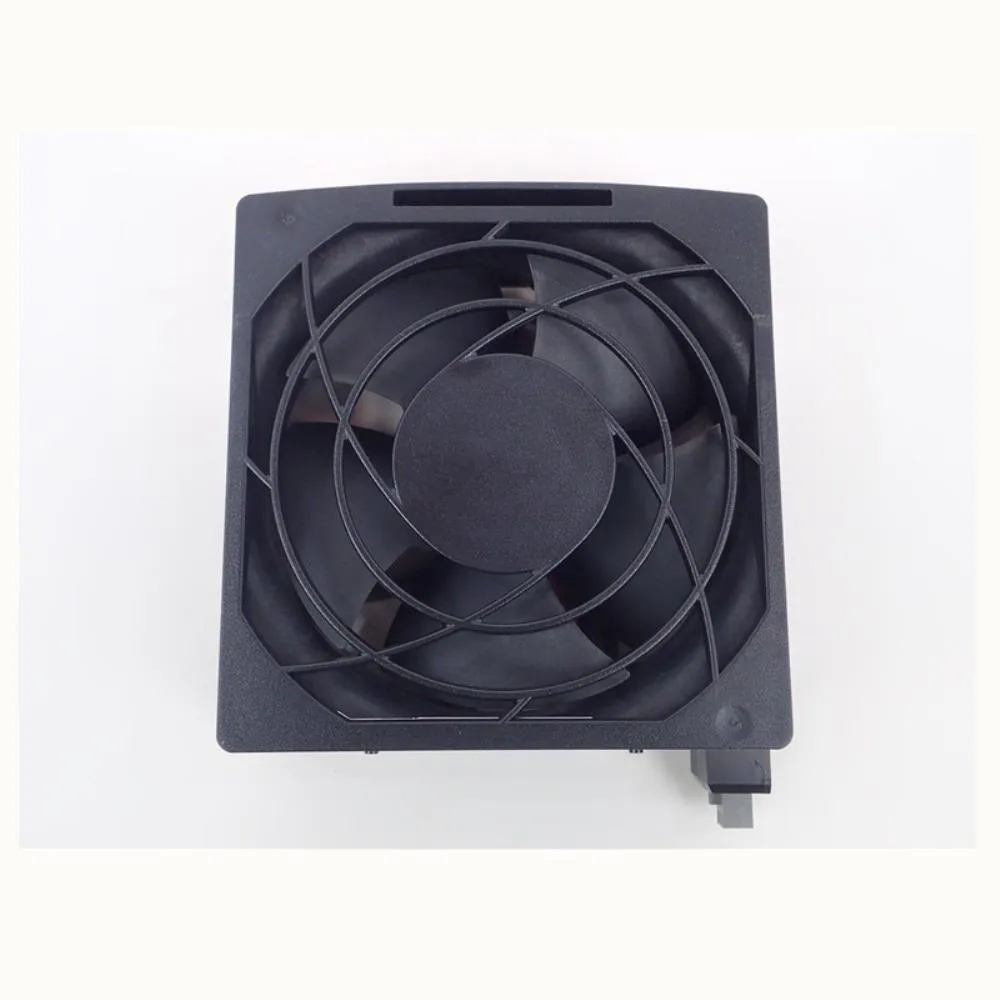 A silver metal heatsink with black fan blades, rectangular frame, four mounting holes visible