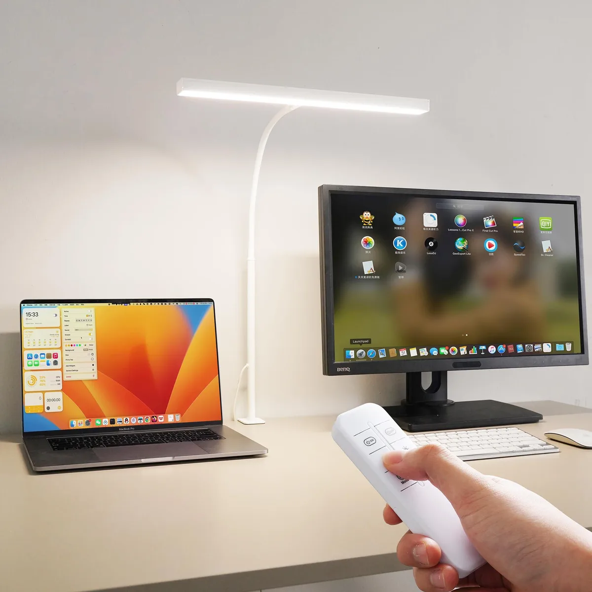 White desk lamp with long flexible gooseneck and clamp base