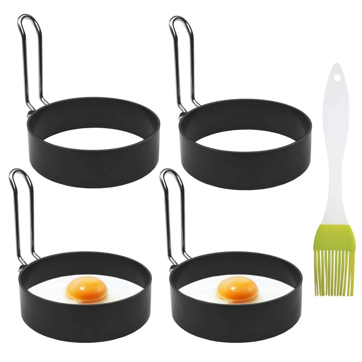 Four stainless steel egg rings with metal handles