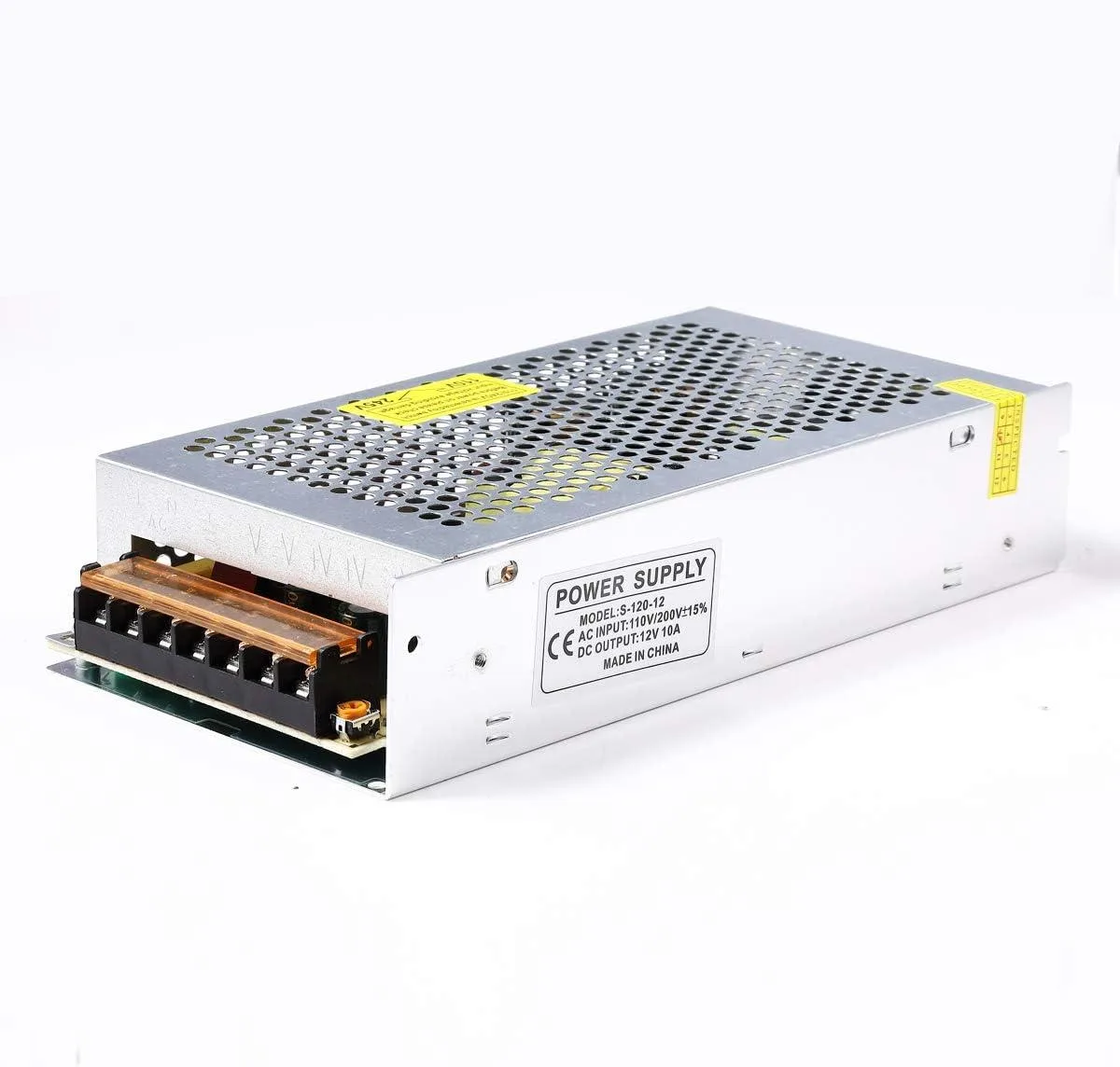 Rectangular metal power supply with ventilation holes and side voltage selector switch