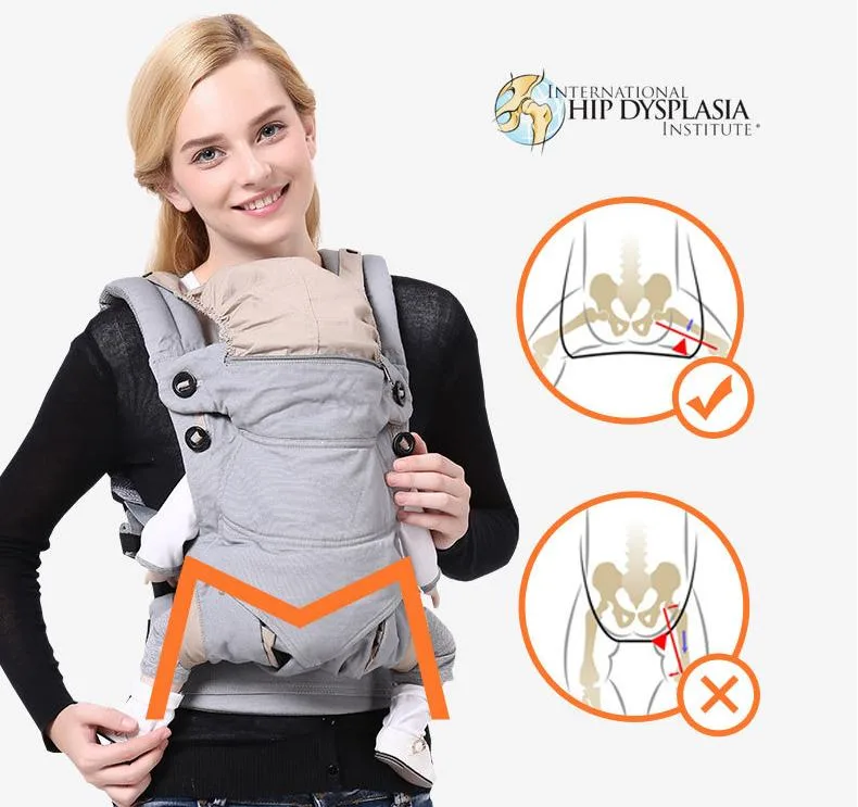 Black ergonomic baby carrier with padded straps and lumbar support, shown flat with buckles visible