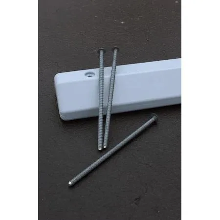 Three silver steel anchor spikes 14 in long