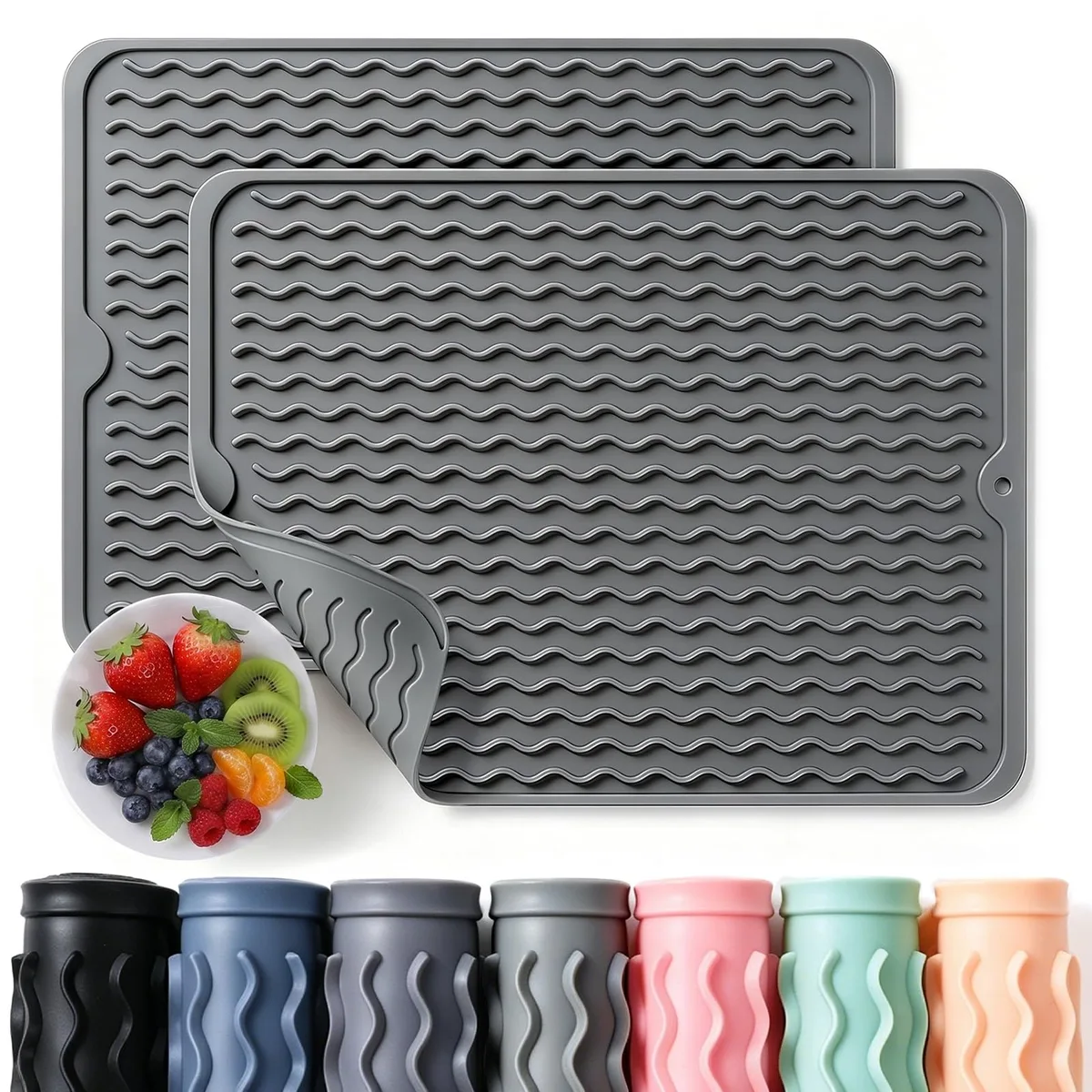 Two flexible ribbed silicone mats in light grey, rolled and flat, showing textured drainage surface