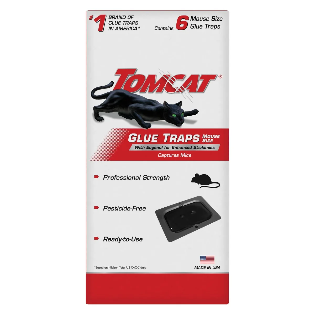 Six rectangular glue traps on a flat surface