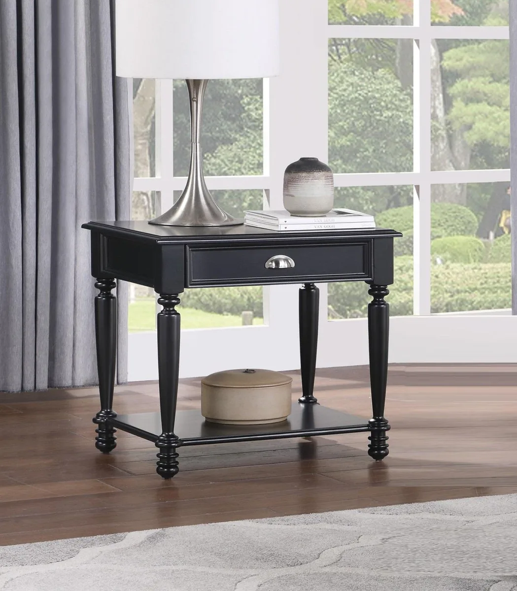 Black wooden side table with drawer and lower shelf, nickel pulls