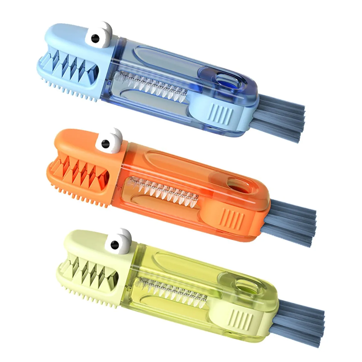 Three crocodile-shaped brushes in blue orange green with silicone U-brush crevice tool and corner brush
