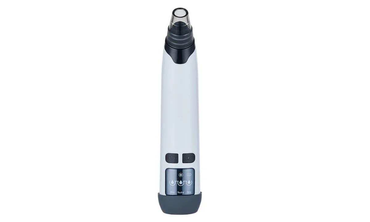 White hand-held pore vacuum with black accents and four interchangeable heads
