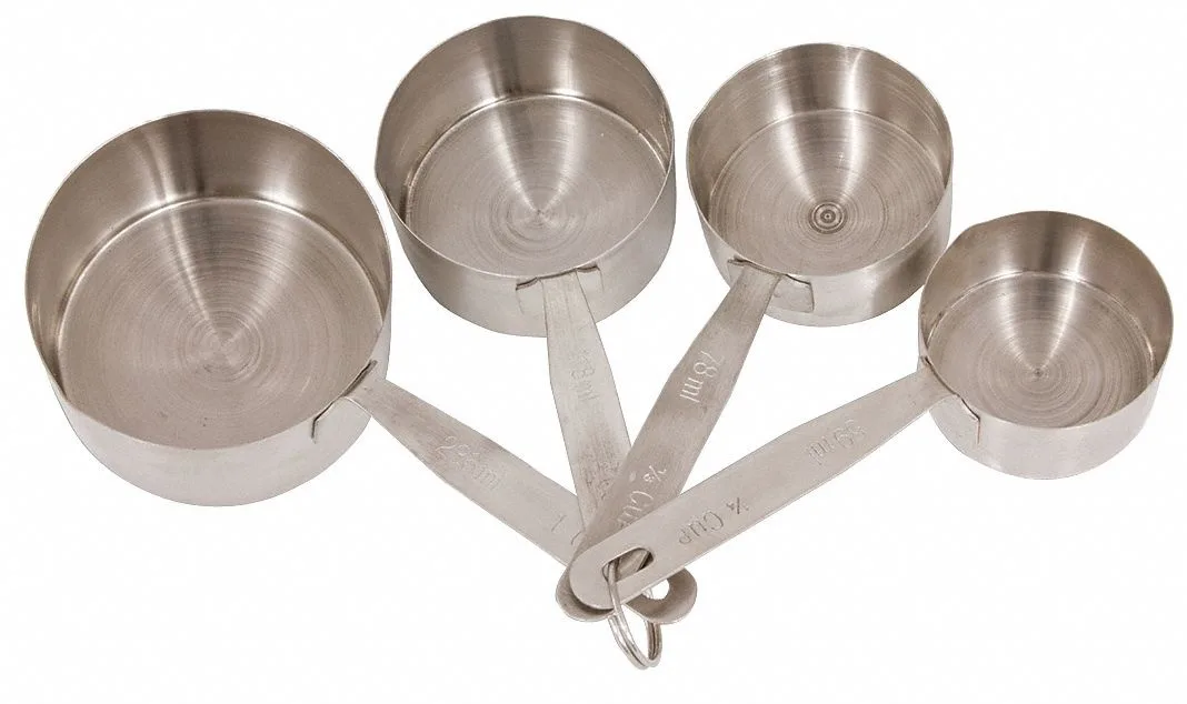 Four-piece stainless steel measuring cup set in gray finish