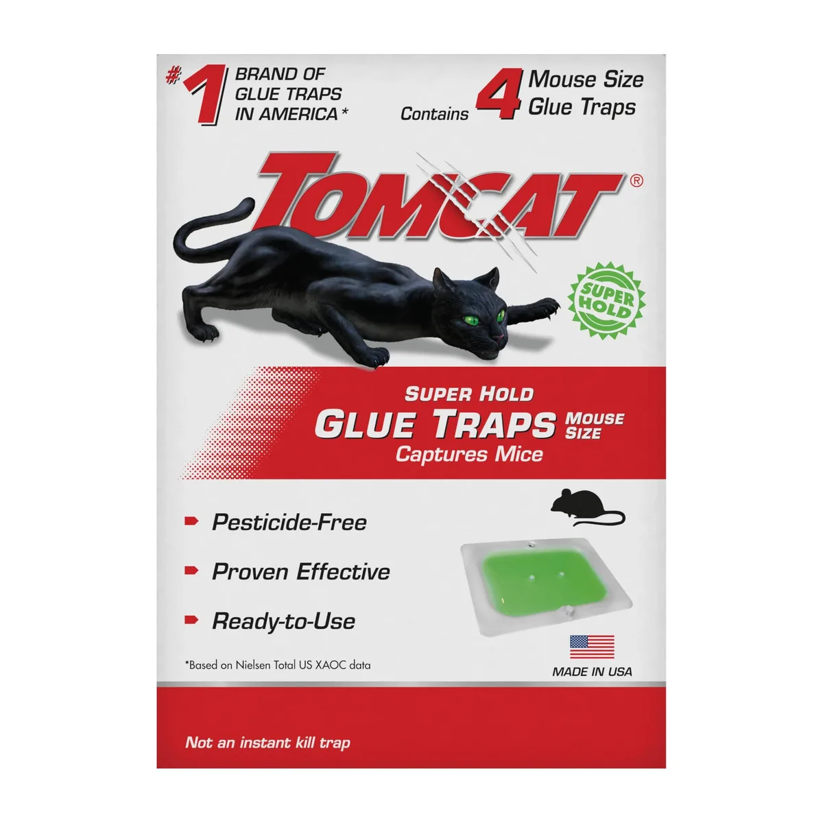 Four flat rectangular glue traps in open packaging