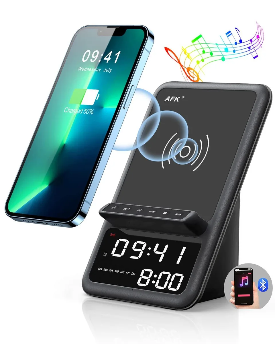 Black rectangular charging station with angled phone stand, fabric speaker grille, LED clock display, and touch controls