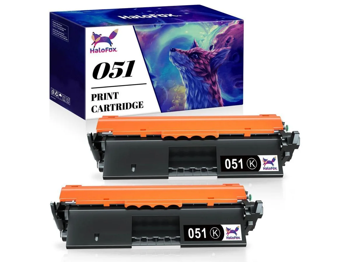 Two black toner cartridges in white boxes side by side