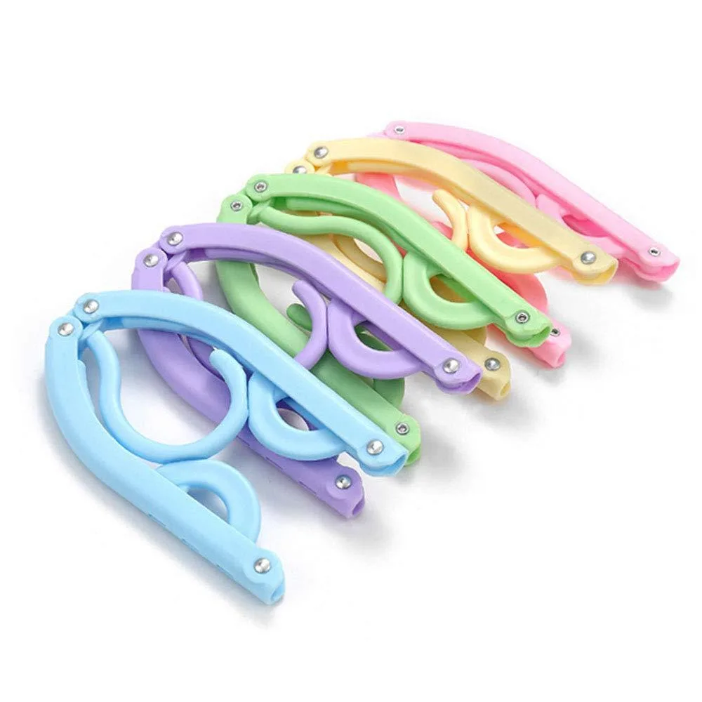 Ten colorful foldable plastic hangers, eighteen inches wide, tri-fold design with anti-slip notches