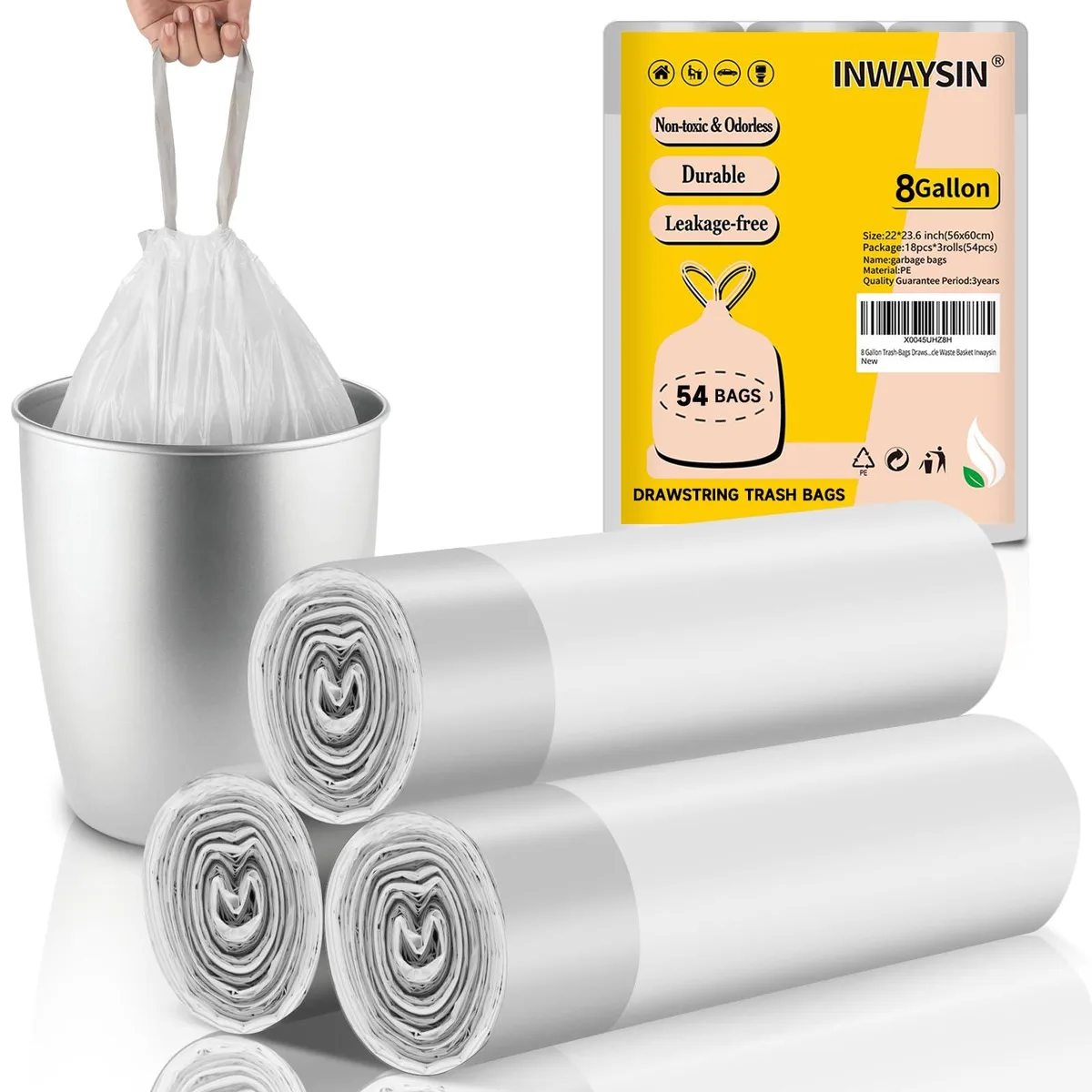 White drawstring trash bags on three compact rolls
