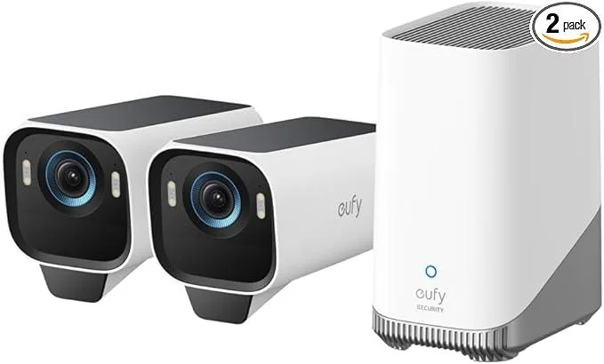 Two white wireless outdoor cameras with solar panels, wall-mounted, IP67 rated, 4.30lb each