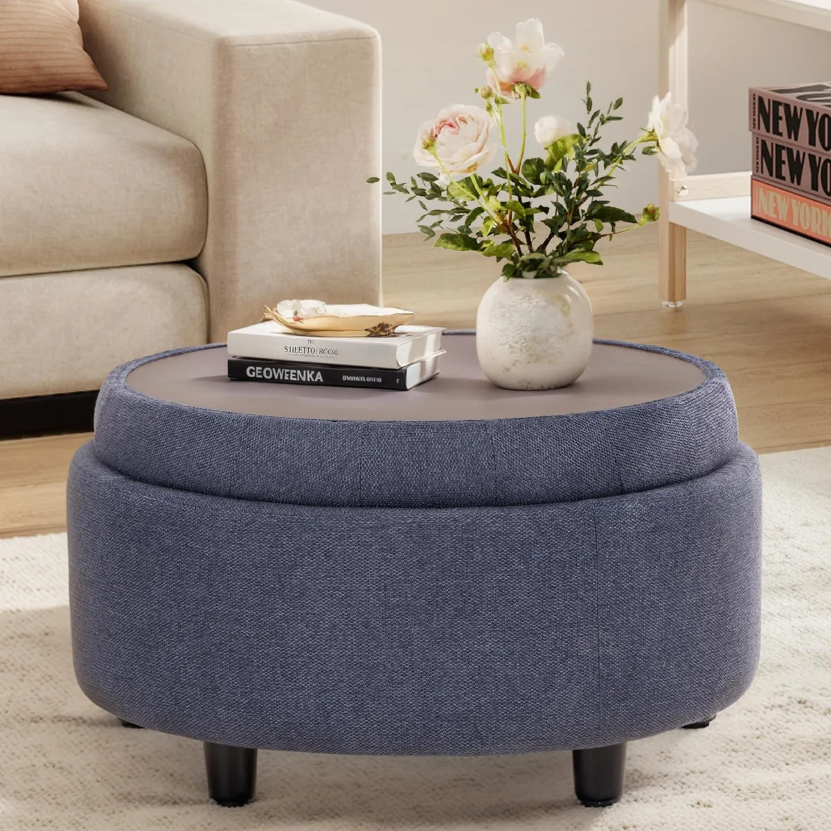 Blue fabric round storage ottoman with reversible tray lid 25 inches diameter 15 inches high