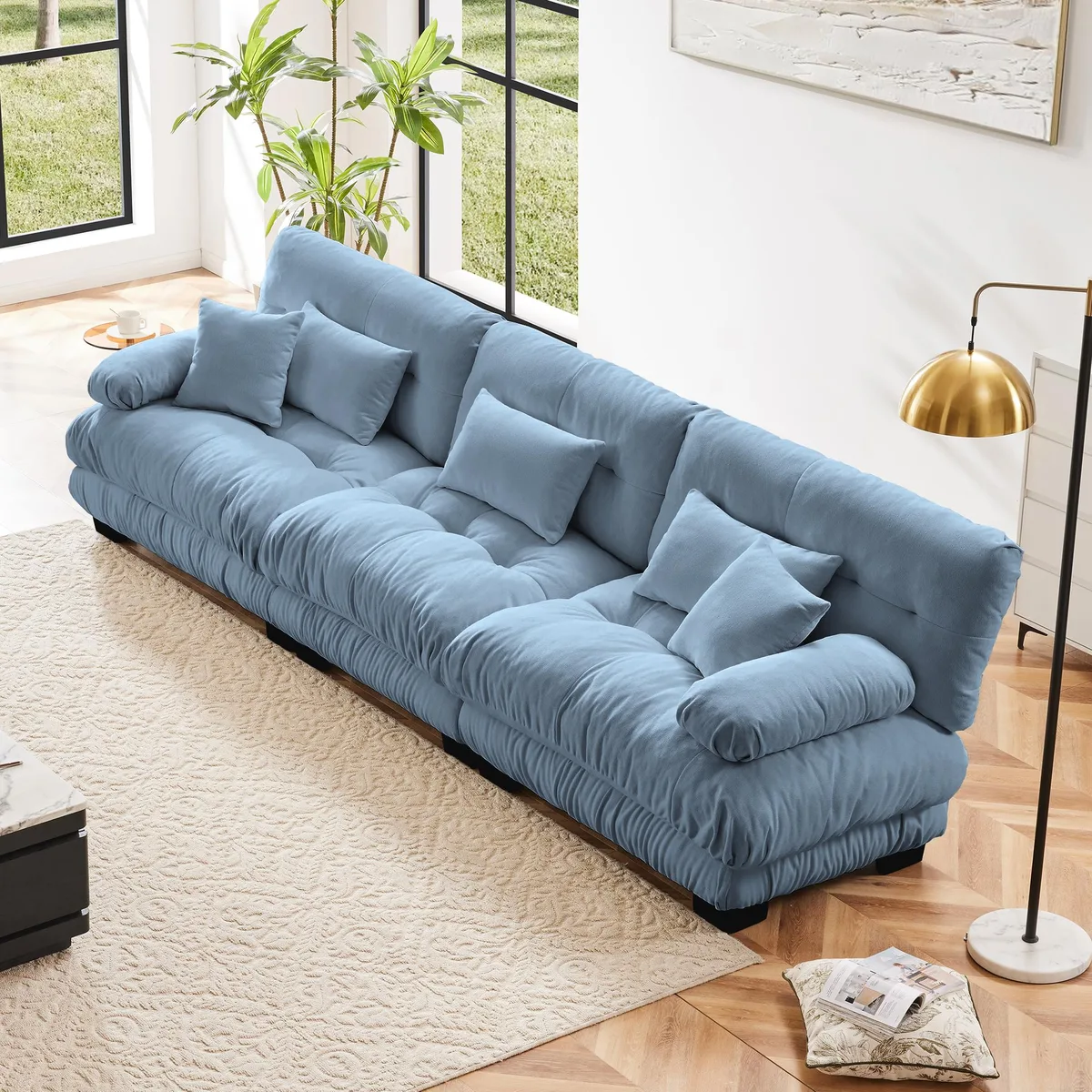 Blue chenille 3-seater sectional sofa with rounded bolster armrests and deep seat cushions