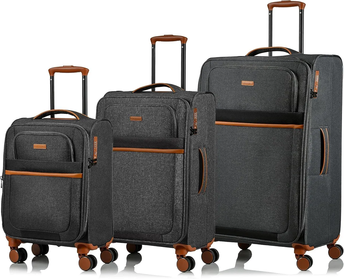 Black 3-piece softside luggage set with rolling cases and expansion zips