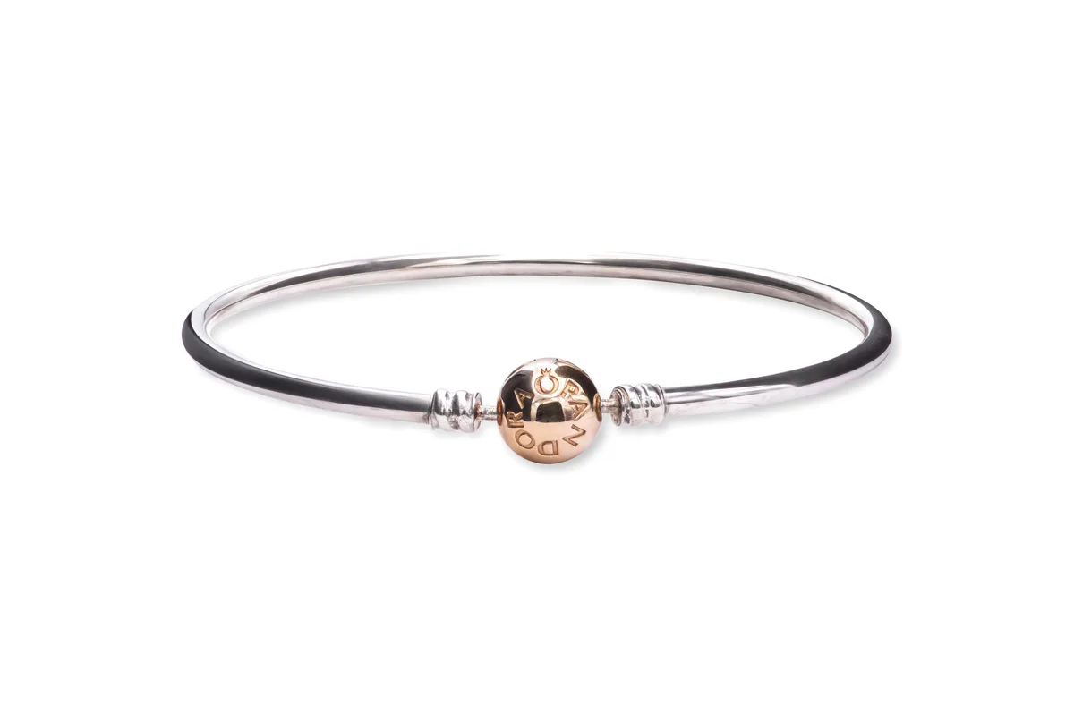 Sterling silver bangle with 14K gold clasp, hand-finished, light and flexible