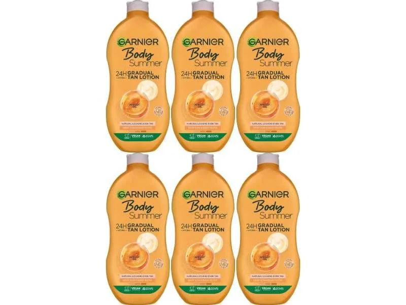 Six white 400 ml lotion bottles standing together