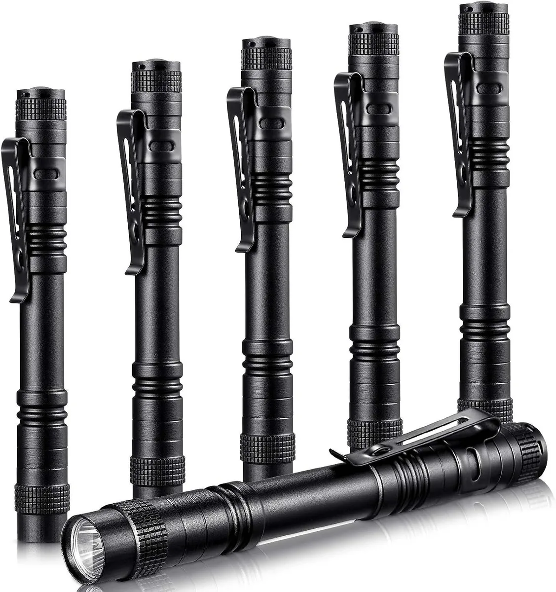 Six silver aluminium penlights with pocket clips arranged together