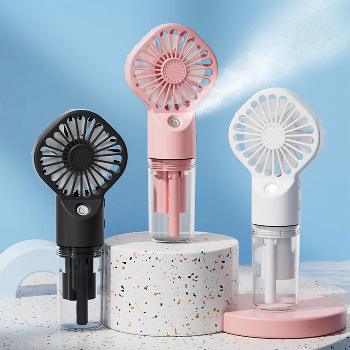 Three silver misting fans, handheld size, 14.33 inches wide